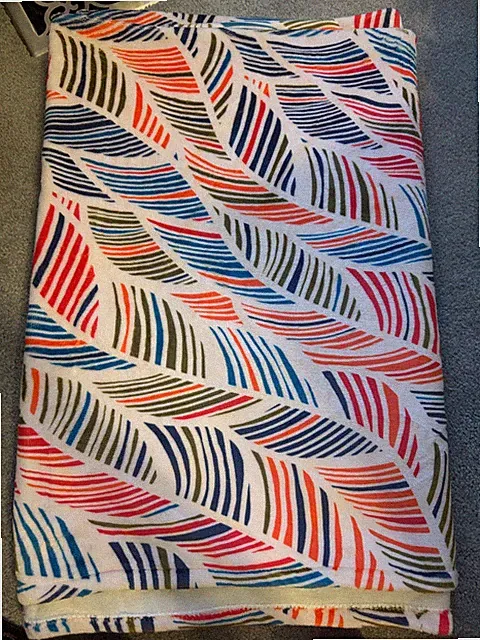 Fleece throw blanket multicolor feather wave design